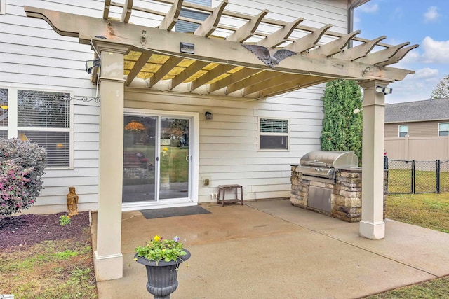 view of patio / terrace with a pergola and area for grilling