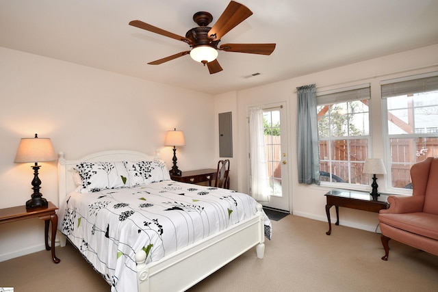 bedroom featuring carpet, electric panel, and ceiling fan