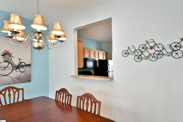 dining room with an inviting chandelier