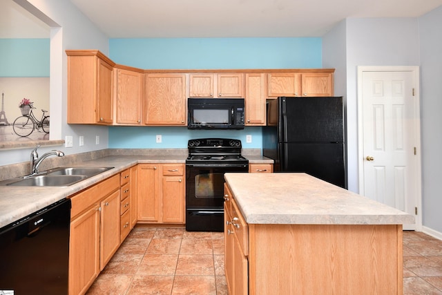 kitchen with sink, a kitchen island, black appliances, and light brown cabinets