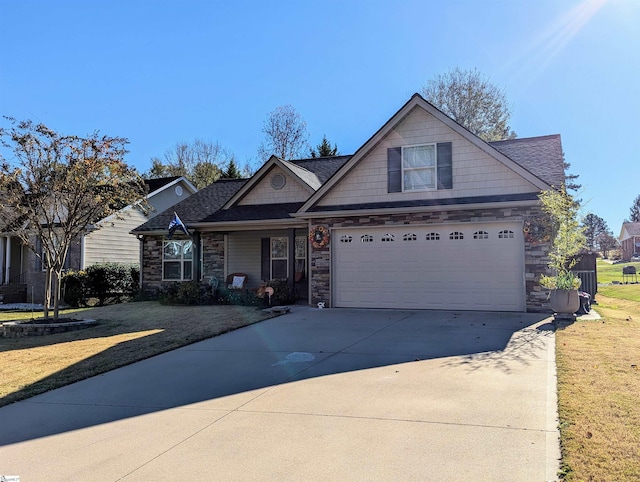 view of front facade with a front lawn and a garage