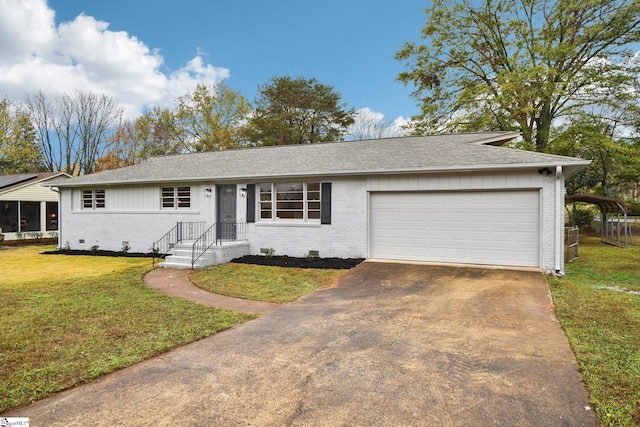 single story home featuring a front yard and a garage