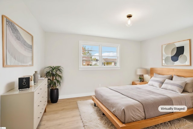 bedroom featuring light hardwood / wood-style floors