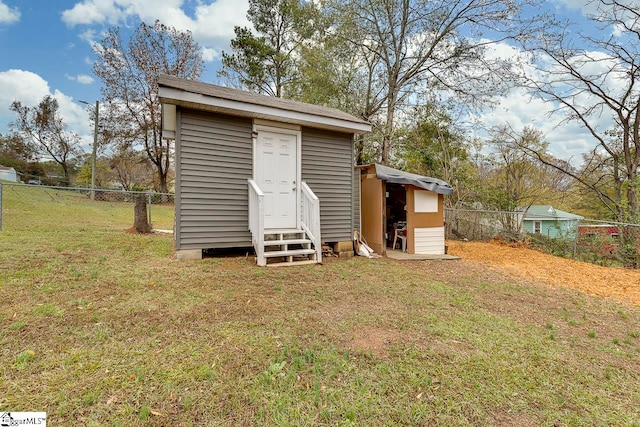 view of outdoor structure with a yard