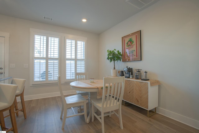 dining area featuring hardwood / wood-style floors