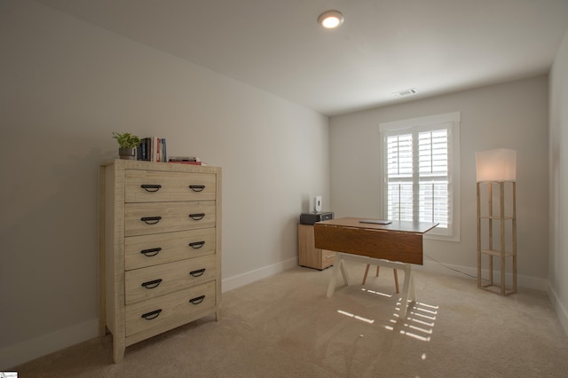 home office featuring light colored carpet