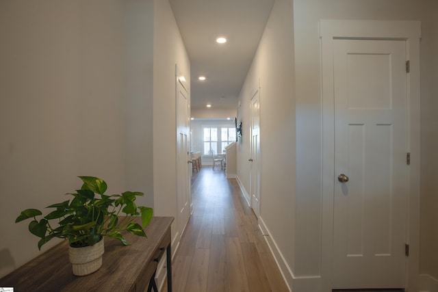 corridor featuring light wood-type flooring