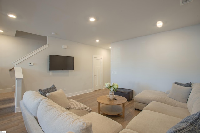 living room with light hardwood / wood-style floors