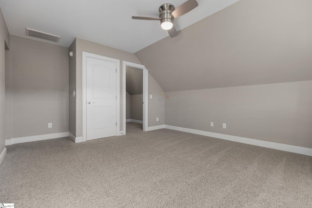 bonus room featuring carpet flooring, ceiling fan, and vaulted ceiling