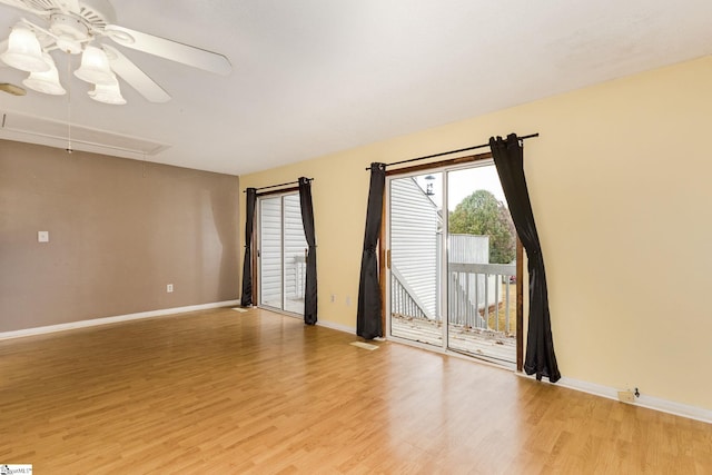 unfurnished room featuring ceiling fan and light hardwood / wood-style floors