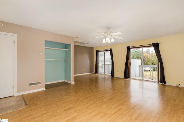 unfurnished room featuring ceiling fan and light hardwood / wood-style flooring