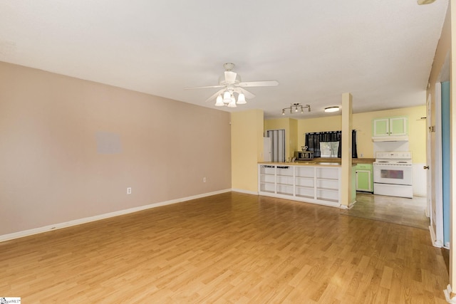 unfurnished living room with light hardwood / wood-style floors and ceiling fan