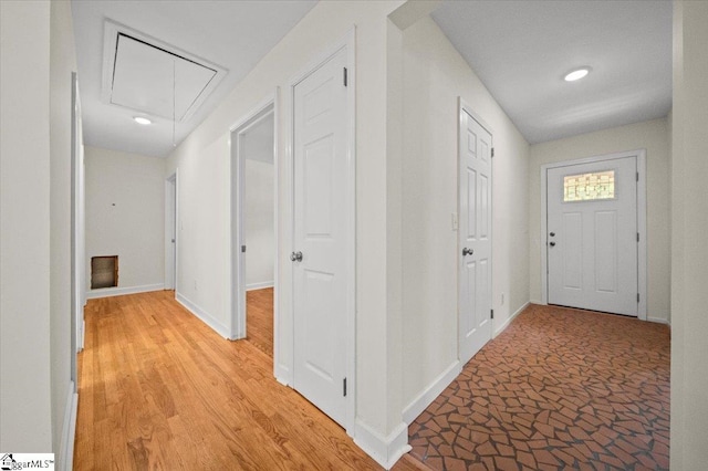 hallway featuring light hardwood / wood-style flooring