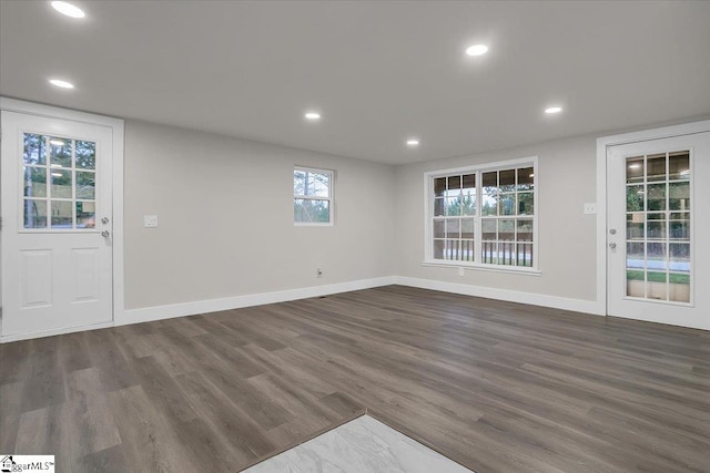 interior space with dark hardwood / wood-style flooring