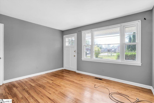 entrance foyer with light wood-type flooring