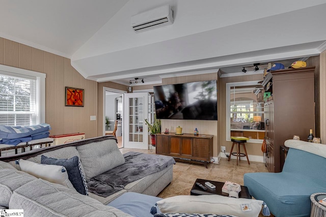 living room with crown molding, a wall mounted AC, lofted ceiling, and wood walls