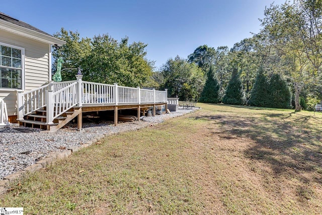 view of yard with a wooden deck