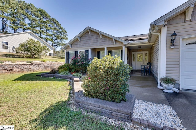 view of front of home with a front lawn