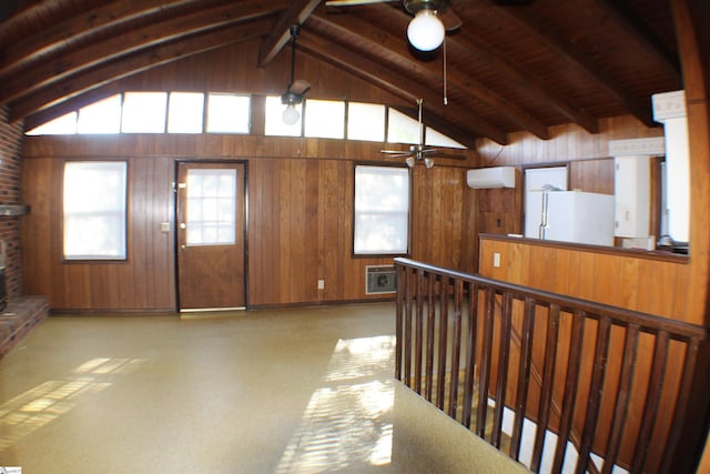 interior space with ceiling fan, vaulted ceiling with beams, an AC wall unit, wood walls, and wood ceiling