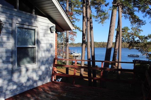 deck featuring a water view