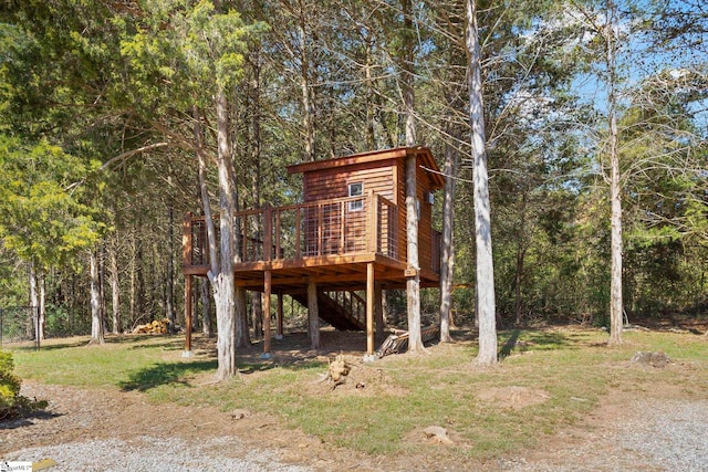 view of yard featuring a wooden deck