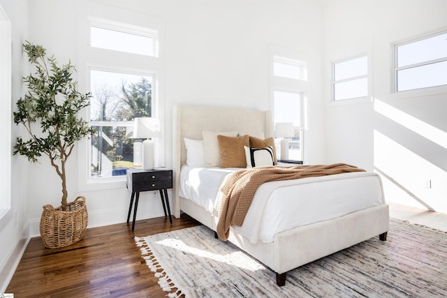 bedroom featuring dark hardwood / wood-style floors