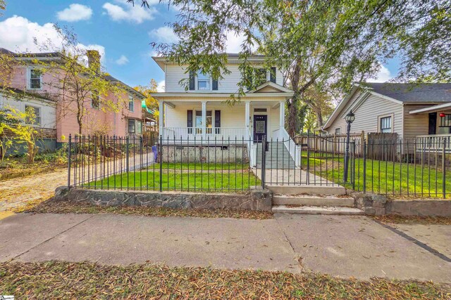 view of front of property with a front lawn and a porch