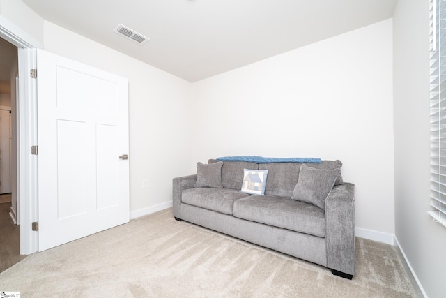 living area with carpet floors