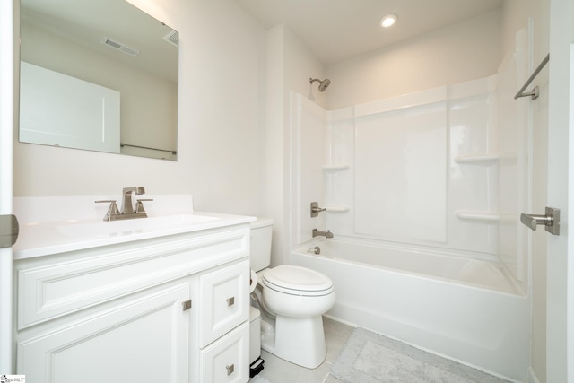 full bathroom featuring tile patterned flooring, vanity,  shower combination, and toilet