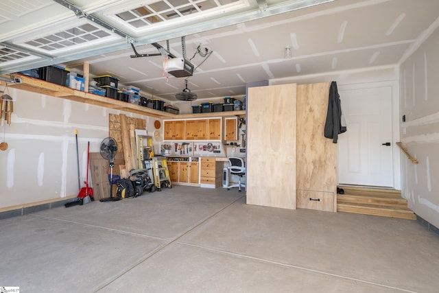 garage featuring a garage door opener