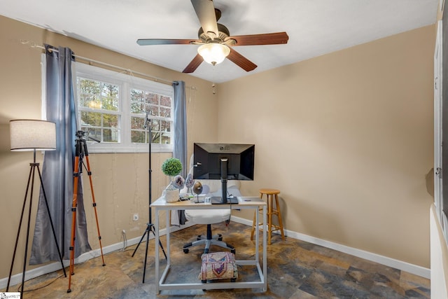 office space with ceiling fan