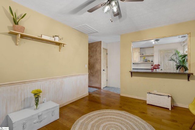 living area with hardwood / wood-style flooring