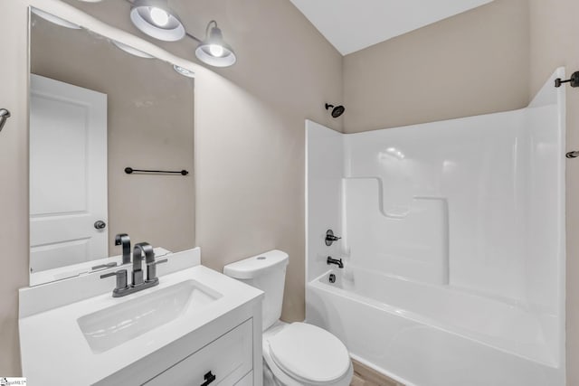 full bathroom featuring vanity, toilet, and shower / washtub combination