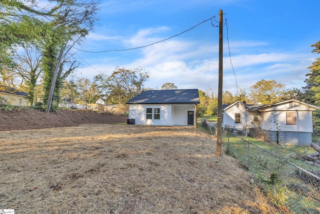 back of property with central air condition unit