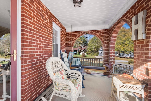 view of patio / terrace with a porch