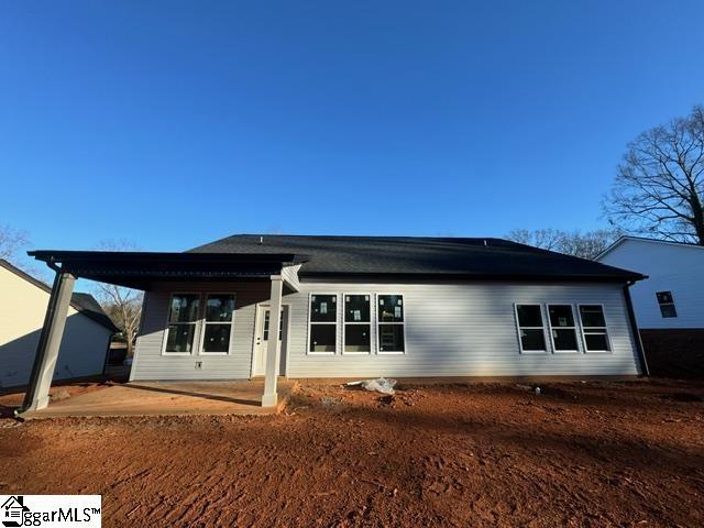 rear view of property with a patio area