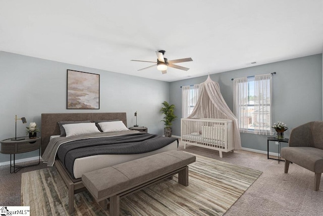 bedroom featuring ceiling fan and carpet floors