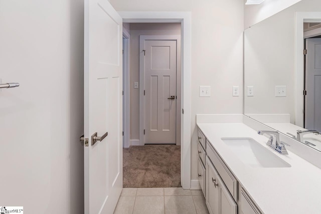 bathroom with vanity and tile patterned floors