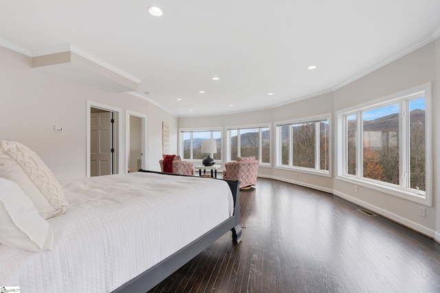 bedroom featuring dark hardwood / wood-style floors and ornamental molding