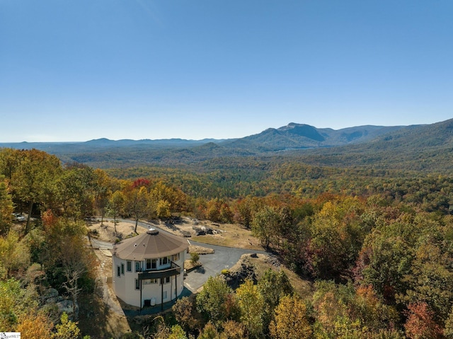 drone / aerial view featuring a mountain view