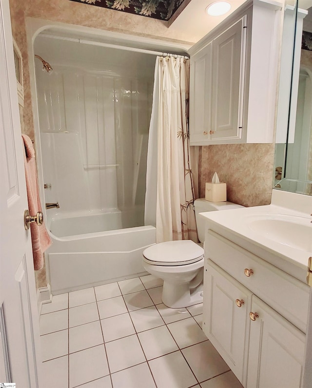 full bathroom with tile patterned floors, vanity, shower / bathtub combination with curtain, and toilet