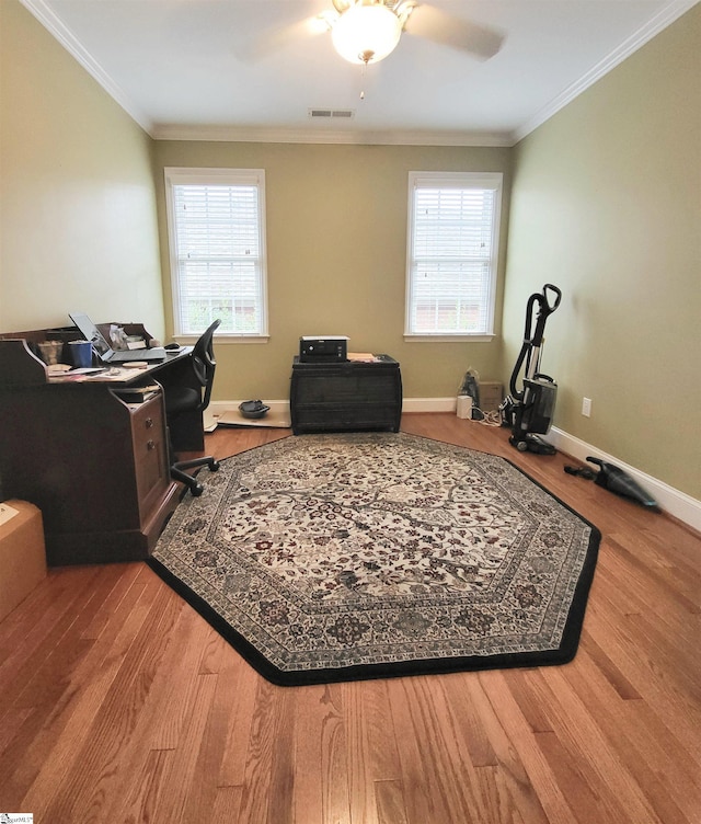 office with crown molding, plenty of natural light, and wood-type flooring