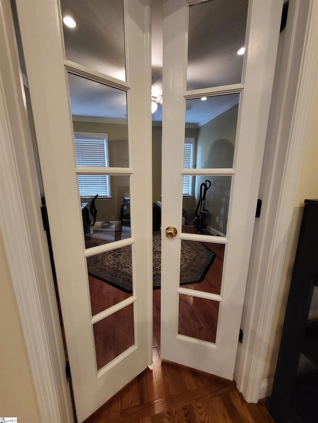 interior details featuring crown molding and parquet floors