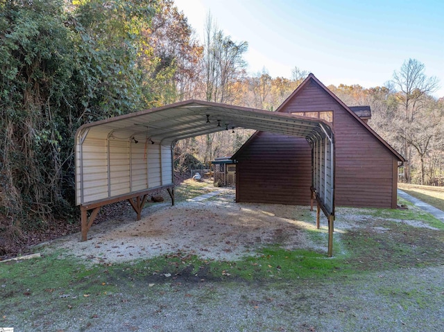 view of parking / parking lot with a carport