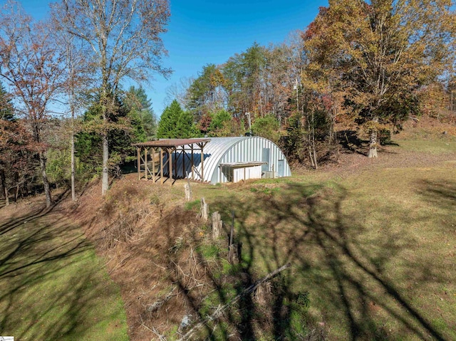 exterior space featuring an outbuilding