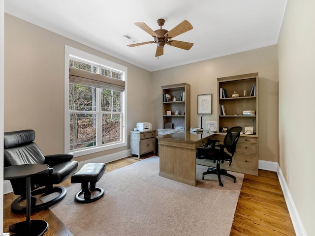 office area featuring ceiling fan and light wood-type flooring