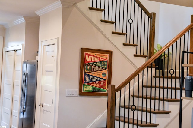 stairway with crown molding