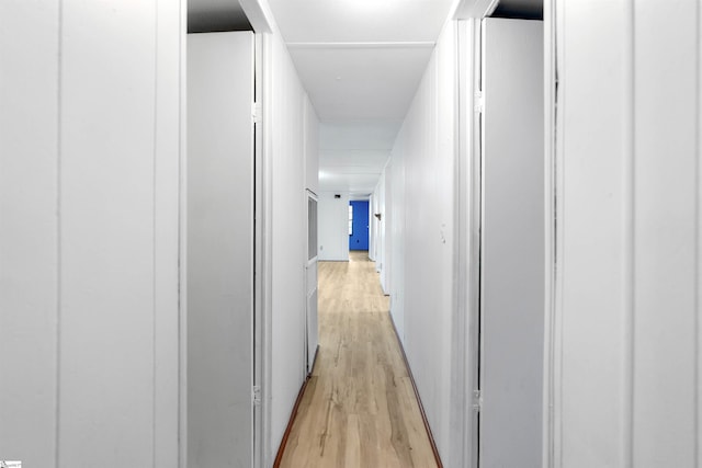 corridor featuring light wood-type flooring