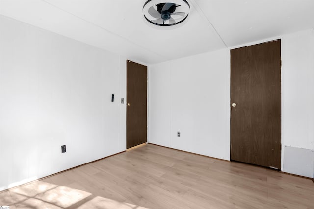 unfurnished room featuring light hardwood / wood-style flooring