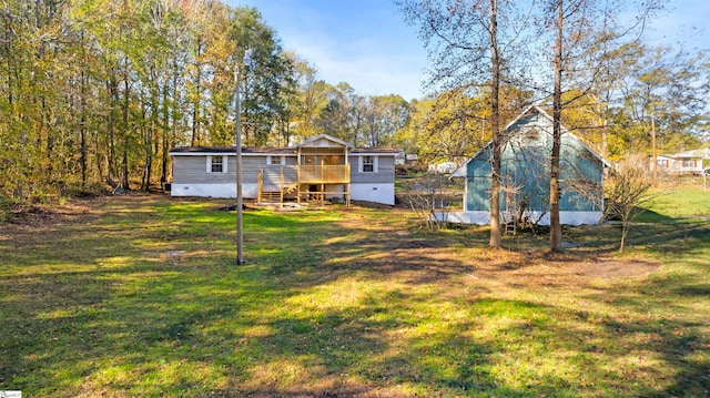 view of yard with a deck